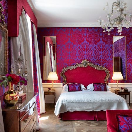 เฮลเวเชียแอนด์บริสตอล - สตาร์โฮเต็ล กอลเลซิโอเน Hotel ฟลอเรนซ์ ภายนอก รูปภาพ A suite at the Hotel de Crillon
