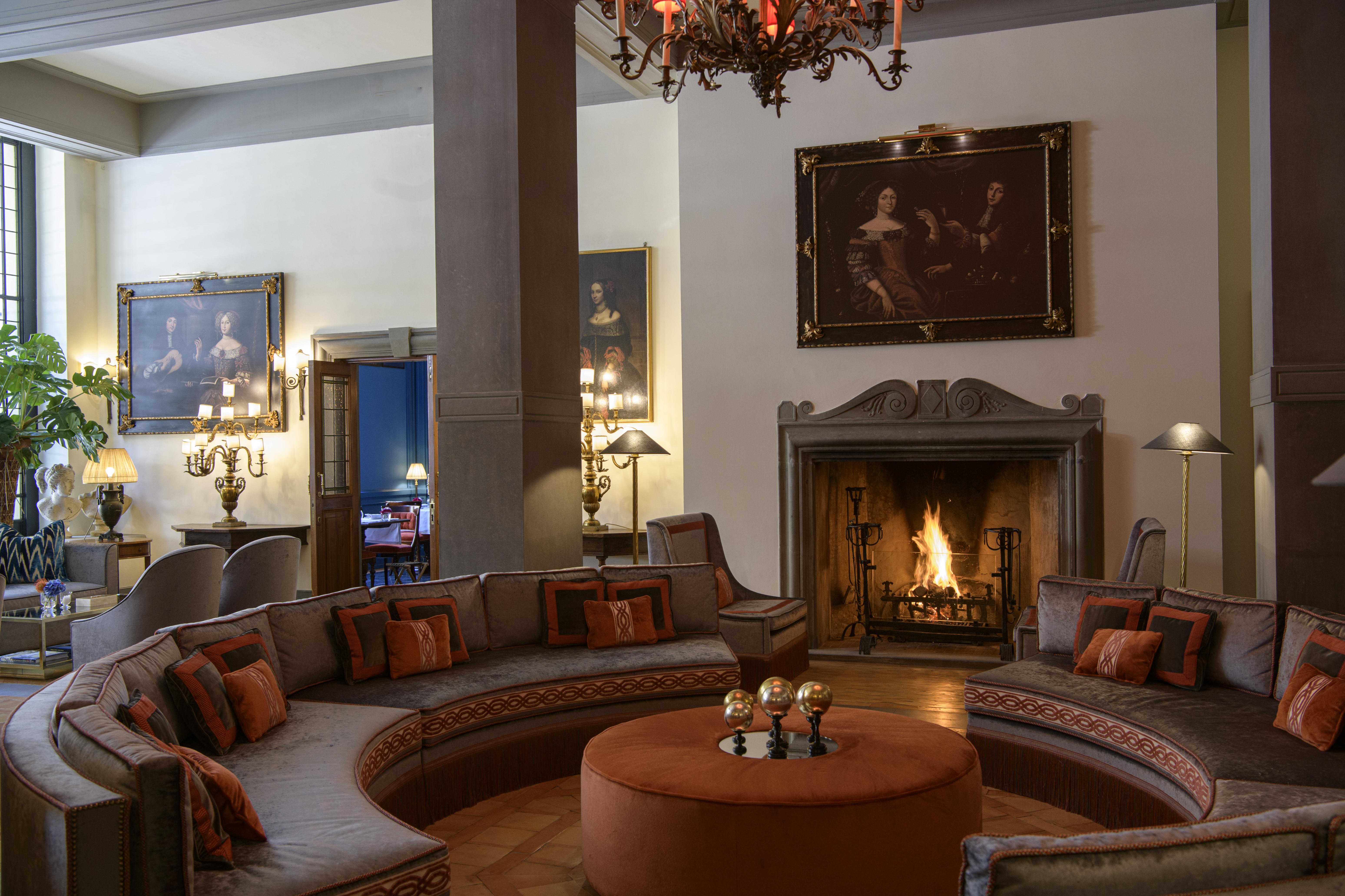 เฮลเวเชียแอนด์บริสตอล - สตาร์โฮเต็ล กอลเลซิโอเน Hotel ฟลอเรนซ์ ภายนอก รูปภาพ The fireplace in the lobby